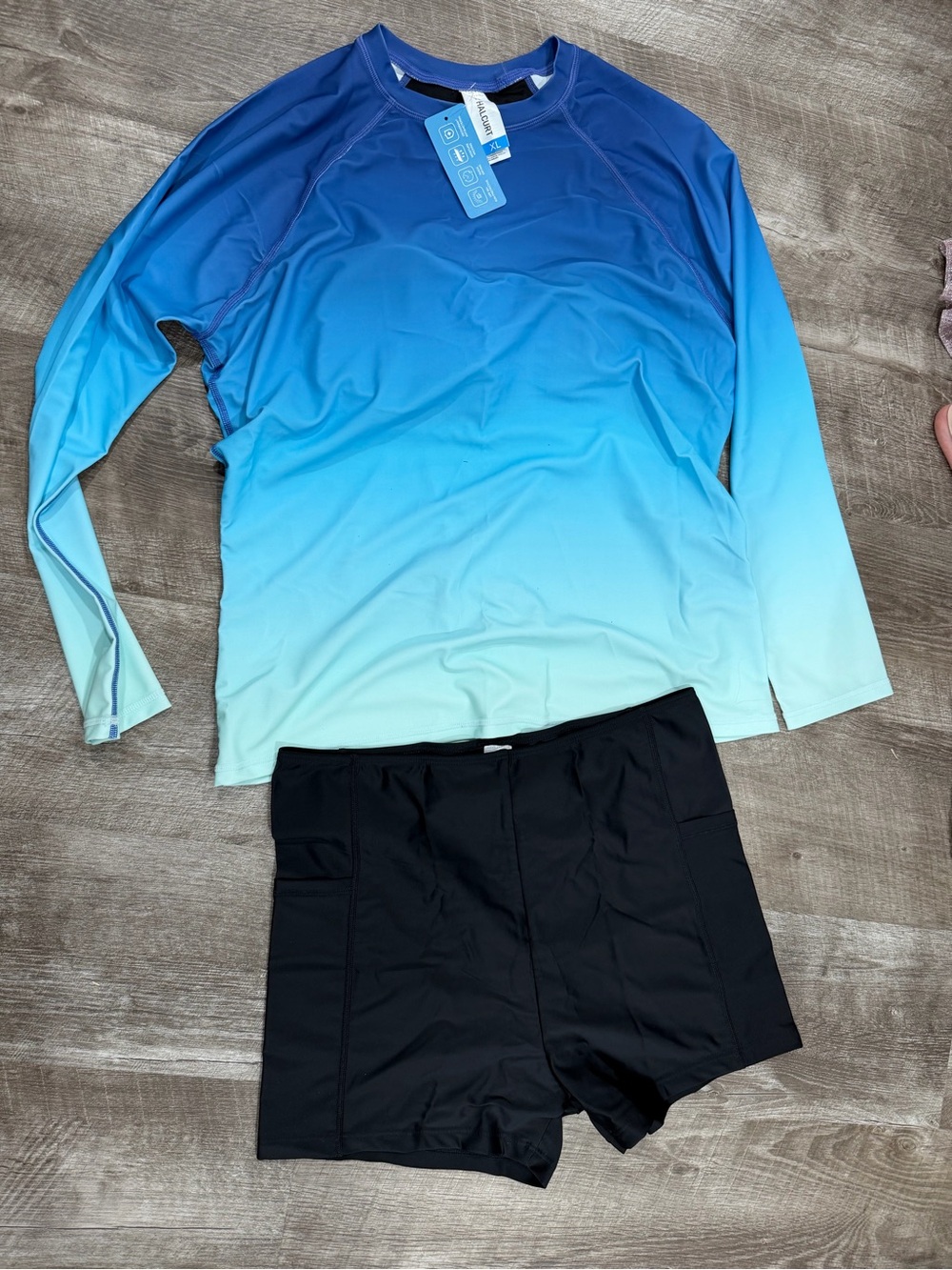 Women’s Ombre Blue Long-Sleeve Swim Top with Black Swim Shorts